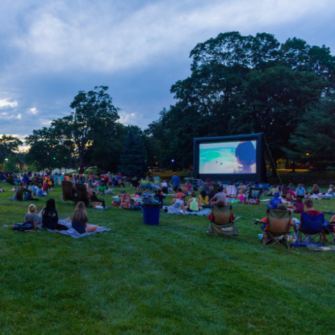 UNH community members enjoying an outdoor movie